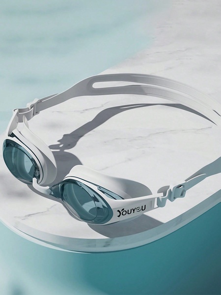 swimming goggles, swim goggles, pool goggles, anti-fog goggles, water sports goggles, product demo, minimalist, lifestyle, calm, fresh, neutral, blue